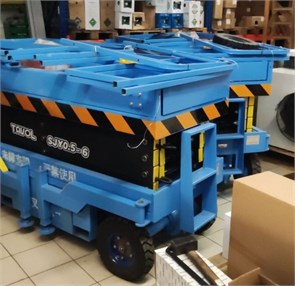 {{photo.Alt || photo.Description || 'Ножничный подъемник TAVOL SJY0.5-6 самоходный'}}